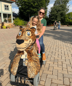 mom and daughter riding scooterpal, scooter with animal covering